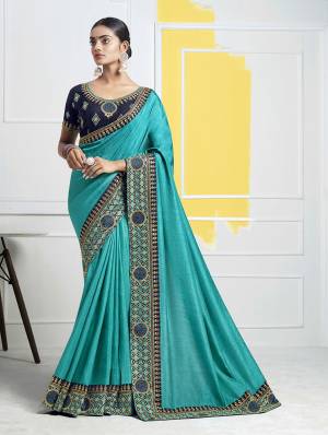 Add This Pretty Designer Saree In Blue Color Paired With Navy Blue Colored Blouse. This Saree Is Fabricated On Soft Art Silk Paired With Art Silk Fabricated Blouse. Buy This Saree Now. 