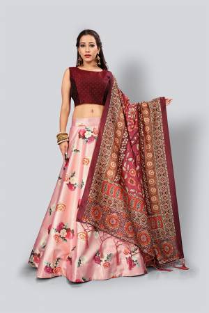 Look Beautiful Wearing This Designer Lehenga Choli In Maroon Colored Blouse And Dupatta Paired With A Contrasting Pink Colored Lehenga. This Digital Printed Lehenga Choli Is Fabricated On Satin Silk Paired With Assam Silk Fabricated Dupatta.
