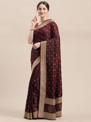 Flaunt Your Rich And Elegant Taste Wearing This Designer Saree In Maroon Color Paired With Maroon Colored Blouse. This Detailed Embroidered Saree And Blouse Are Satin Silk Based Which Also Gives A Rich Look To Your Personality. 