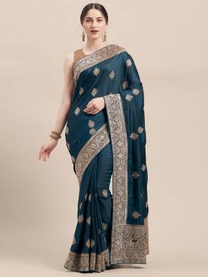 You Will Definitely Earn Lots Of Compliments Wearing This Designer Embroidred Saree In Blue Color Paired With Same Blue Colored Blouse. This Saree And Blouse Are Fabricated On Satin Silk Which Is Light Weight, Durable And Easy To Carry Throughout The Gala. 