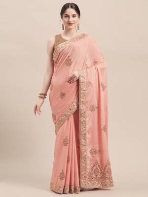 Get Ready For The Upcoming Wedding And Festive Season With This Very Beautiful Designer Saree In Elegant Peach Color Paired With Peach Colored Blouse. This Saree And Blouse Are Fabricated On Chinon Silk Beautified With Jari & Thread Embroidery Highlighted With Stone Work. Its Pretty Elegant Color And Rich Fabric Will Earn You Lots Of Compliments From Onlookers. 