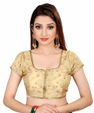 Grab This Beautiful Readymade Blouse To Pair Up With Your Plain Or Printed Saree Or Lehenga. This Pretty Cream Colored Blouse IS Fabricated On Cotton Silk And Available In All Regular Sizes. 