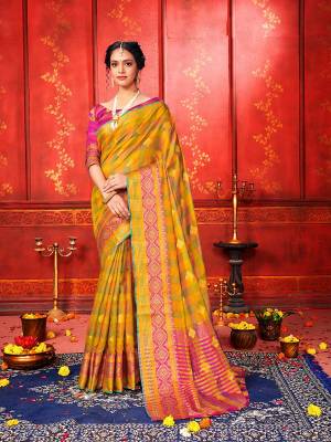 For A Proper Traditional Look, Grab This Checks Patterned Designer Saree In Musturd Yellow Color Paired With Rani Pink Colored Blouse. This Saree And Blouse Are Fabricated On Art Silk Beautified With Weave. It Is Light In Weight And Easy To Carry All Day Long. 