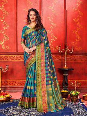 For A Proper Traditional Look, Grab This Checks Patterned Designer Saree In Blue Color Paired With Blue Colored Blouse. This Saree And Blouse Are Fabricated On Art Silk Beautified With Weave. It Is Light In Weight And Easy To Carry All Day Long. 