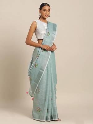 You Will Definitely Earn Lots Of Compliments Wearing This Designer Saree In Pastel Blue Color Paired With Pastel Blue Colored Blouse. This Pretty Saree And Blouse Are Fabricated On Linen Cotton Beautified With Thread Embroidery. It Is Light In Weight, Durable And Easy To Care For. 