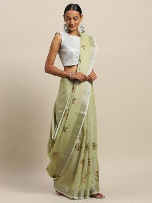 Flaunt Your Rich And Elegant Taste Wearing This Designer Saree In Pastel Green Color Paired With Pastel Green Colored Blouse. This Elegant Looking Saree And Blouse Are Fabricated On Linen Cotton Which Has Rich Feel And Beautified With Thread Embroidery. Buy This Pretty Saree Now.