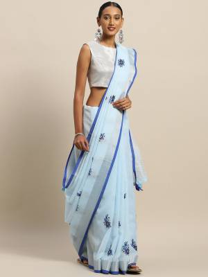 Flaunt Your Rich And Elegant Taste Wearing This Designer Saree In Sky Blue Color Paired With Blue Colored Blouse. This Elegant Looking Saree And Blouse Are Fabricated On Linen Cotton Which Has Rich Feel And Beautified With Thread Embroidery. Buy This Pretty Saree Now.