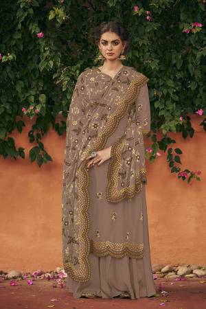 Add This Very Beautiful Designer Straight Suit To Your Wardrobe In Mauve Grey Color. Its Pretty Embroidered Top And Dupatta Are Fabricated On Italian Silk Paired With Santoon Fabricated Bottom. Buy This Semi-Stitched Suit Now.