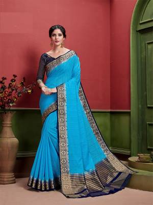 Add This Pretty Elegant Looking Saree To Your Wardrobe In Blue Color Paired With Navy Blue Colored Blouse. This Saree And Blouse Are Fabricated On Art Silk Which Is Durable And Gives A Pretty Rich Look. 
