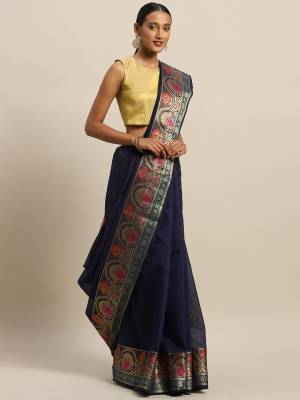 Simple And Elegant Looking Designer Weaved Saree Is Here In Navy Blue Color Paired With Contrasting Maroon Colored Embroidered Blouse. This Saree And Blouse Are Fabricated On Handloom Silk Which Is Durable, Light Weight And Easy To Care For.