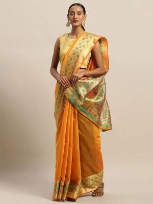 Simple And Elegant Looking Designer Weaved Saree Is Here In Musturd Yellow Color Paired With Contrasting Green Colored Embroidered Blouse. This Saree And Blouse Are Fabricated On Handloom Silk Which Is Durable, Light Weight And Easy To Care For.