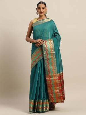 Simple And Elegant Looking Designer Weaved Saree Is Here In Teal Blue Color Paired With Contrasting Maroon Colored Embroidered Blouse. This Saree And Blouse Are Fabricated On Handloom Silk Which Is Durable, Light Weight And Easy To Care For.
