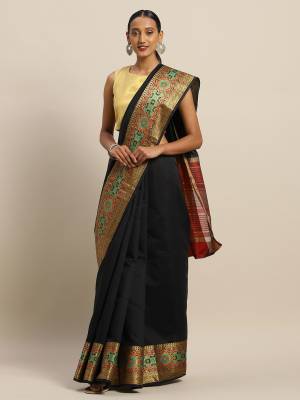 Simple And Elegant Looking Designer Weaved Saree Is Here In Black Color Paired With Contrasting Red Colored Embroidered Blouse. This Saree And Blouse Are Fabricated On Handloom Silk Which Is Durable, Light Weight And Easy To Care For.