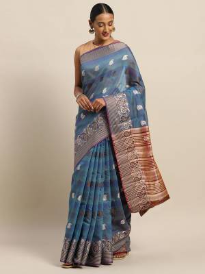 Celebrate This Festive Season With Beauty And Comfort Wearing This Designer Saree In Blue Color Paired with Contrasting Brown Colored Blouse. This Saree and Blouse Are Fabricated On Cotton Handloom Which Gives A Rich Look To Your Personality. 
