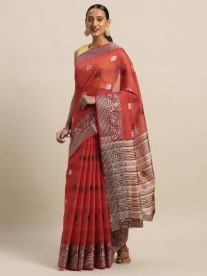 Celebrate This Festive Season With Beauty And Comfort Wearing This Designer Saree In Red Color Paired with Contrasting Brown Colored Blouse. This Saree and Blouse Are Fabricated On Cotton Handloom Which Gives A Rich Look To Your Personality. 