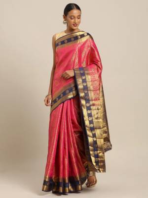 Celebrate This Festive Season Wearing This Pretty Silk Based Saree In Dark Pink Paired With Contrasting Navy Blue Colored Blouse. This Saree And Blouse Are Fabricated On Art Silk Beautified with Weave All Over. 