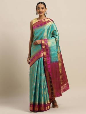 Rich And Elegant Looking Designer Silk Based Saree Is Here In Blue Color Paired With Contrasting Magenta Pink Colored Blouse. This saree And Blouse Are Fabricated On Art Silk Which Gives A Rich Look To Your Personality. 
