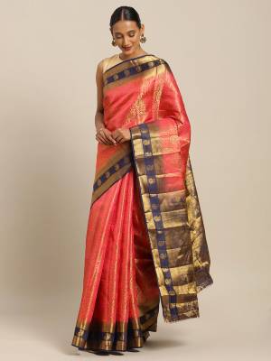 Celebrate This Festive Season Wearing This Pretty Silk Based Saree In Dark Peach Paired With Dark Peach Colored Blouse. This Saree And Blouse Are Fabricated On Art Silk Beautified with Weave All Over. 