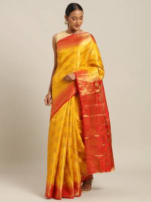 Rich And Elegant Looking Designer Silk Based Saree Is Here In Yellow Color Paired With Contrasting Orange Colored Blouse. This saree And Blouse Are Fabricated On Art Silk Which Gives A Rich Look To Your Personality. 