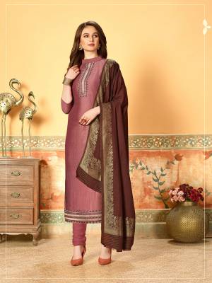 Grab This Very Beautiful Designer Dress Material In Pink Color Paired With Contrasting Brown Colored Dupatta. Its Pretty Embroidered Top Is Fabricated On Art Silk With Self Butti Paired With Santoon Bottom And Jacquard Cotton Silk Dupatta. Buy This Straight Suit Now. 