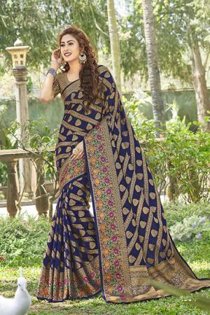 For A Proper Traditional Wear, Grab This Designer Silk Based Saree In Navy Blue Color. This Saree And Blouse Are Fabricated On Art Silk Beautified With Attractive Detailed Weave. Buy Now.