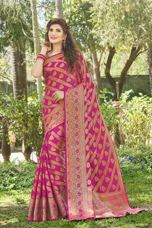 For A Proper Traditional Wear, Grab This Designer Silk Based Saree In Rani Pink Color. This Saree And Blouse Are Fabricated On Art Silk Beautified With Attractive Detailed Weave. Buy Now.