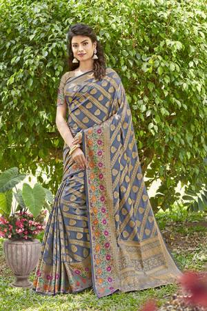 For A Proper Traditional Wear, Grab This Designer Silk Based Saree In Grey Color. This Saree And Blouse Are Fabricated On Art Silk Beautified With Attractive Detailed Weave. Buy Now.