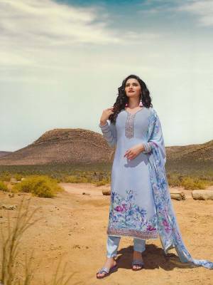Celebrate This Festive Season With Beauty And Comfort Wearing This Designer Straight Suit In All Over Powder Blue Color. This Suit Is Crepe Based Paired With Chiffon Fabricated Dupatta. It Is Beautified With Floral Prints And Embroidery Giving It An Attractive Look.
