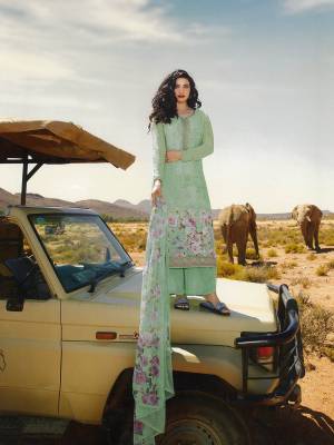 Celebrate This Festive Season With Beauty And Comfort Wearing This Designer Straight Suit In All Over Light Green Color. This Suit Is Crepe Based Paired With Chiffon Fabricated Dupatta. It Is Beautified With Floral Prints And Embroidery Giving It An Attractive Look.