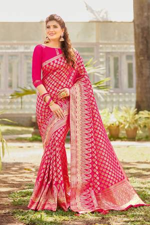 For A Proper Traditional Look, Grab This Designer Silk Based Saree In Dark Pink Color. This Saree And Blouse Are Fabricated On Art Silk. It Is Beautified With Heavy Weave All Over. 