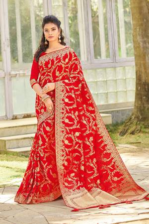 For A Proper Traditional Look, Grab This Designer Silk Based Saree In Red Color. This Saree And Blouse Are Fabricated On Art Silk. It Is Beautified With Heavy Weave All Over. 
