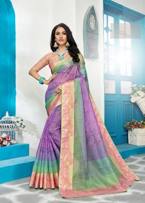 For Your Semi-Casuals Or Festive Wear ,Grab This Designer Saree In Purple Color Paired With Peach Colored Blouse. This Printed Saree Is Fabricated On Cora Checks. It Is Light Weight, Durable And Easy To Carry.