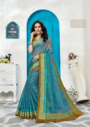 For Your Semi-Casuals Or Festive Wear ,Grab This Designer Saree In Blue Color Paired With Olive Green Colored Blouse. This Printed Saree Is Fabricated On Cora Checks. It Is Light Weight, Durable And Easy To Carry.