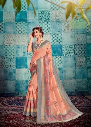 Rich And Elegant Looking Designer Saree Is  Here In Peach Color Paired With Grey Colored Blouse. This Saree and Blouse Are Tussar Silk Based Beautified With Prints And Thread Work. Buy Now.