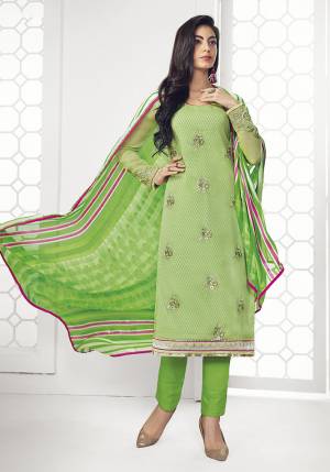 Get This Pretty Designer Semi-Stitched Suit In Light Green And Green Color. Its Top Is Georgette Based Beautified With Embroidery Paired With Plain Santoon Bottom and Satin Dupatta. Buy This Straight Suit Now.