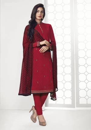 Get This Pretty Designer Semi-Stitched Suit In Red And Black Color. Its Top Is Georgette Based Beautified With Embroidery Paired With Plain Santoon Bottom and Satin Dupatta. Buy This Straight Suit Now.