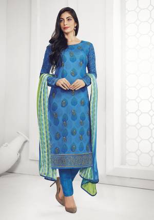 For Your Semi-Casual Wear, Grab This Designer Straight Suit In Blue and Multi Color. Its Embroidred Top Is Fabricated On Georgette Paired With Santoon Bottom And Satin Based Dupatta. This Pretty Suit Is Light In Weight And Easy To Carry All Day Long. 
