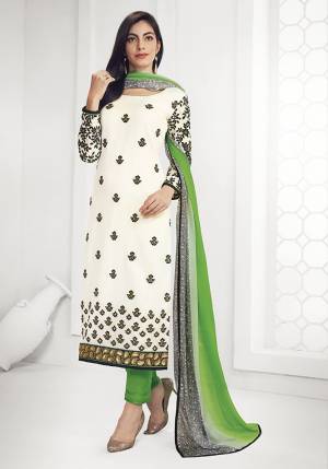 Get This Pretty Designer Semi-Stitched Suit In White And Green Color. Its Top Is Georgette Based Beautified With Embroidery Paired With Plain Santoon Bottom and Satin Dupatta. Buy This Straight Suit Now.