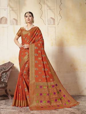 Enhance Your Personality In This Lovely Orange Colored Designer Saree. This Saree And Blouse Are Fabricated On Art Silk Beautified With Weave All Over. Buy This Saree Now. 