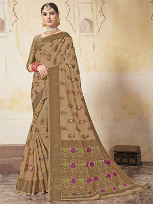 Enhance Your Personality In This Lovely Beige Colored Designer Saree. This Saree And Blouse Are Fabricated On Art Silk Beautified With Weave All Over. Buy This Saree Now. 