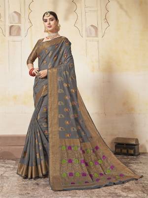 Enhance Your Personality In This Lovely Grey Colored Designer Saree. This Saree And Blouse Are Fabricated On Art Silk Beautified With Weave All Over. Buy This Saree Now. 