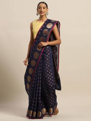 Simple And Elegant Looking Designer Weaved Saree Is Here In Navy Blue?Color Paired With Navy Blue Colored Embroidered Blouse. This Saree And Blouse Are Fabricated On Handloom Silk Which Is Durable, Light Weight And Easy To Care For.