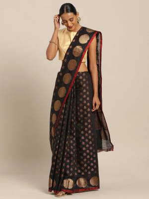 Simple And Elegant Looking Designer Weaved Saree Is Here In Black?Color Paired With Black & Brown Colored Embroidered Blouse. This Saree And Blouse Are Fabricated On Handloom Silk Which Is Durable, Light Weight And Easy To Care For.
