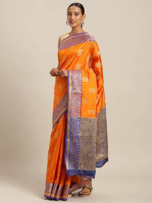 Celebrate This Festive Season With Beauty And Comfort Wearing This Designer Saree In Orange Color Paired with Contrasting Light Purple Colored Blouse. This Saree and Blouse Are Fabricated On Cotton Handloom Which Gives A Rich Look To Your Personality