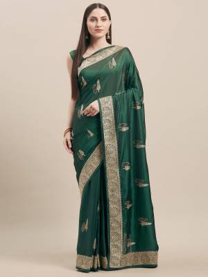 Flaunt Your Rich and Elegant Taste In Minimal Embroidered Designer saree In Dark Green Color Paired With Dark Green Colored Blouse. This Pretty Saree Is Fabricated On Satin Silk Paired With Art Silk Fabricated Blouse. 