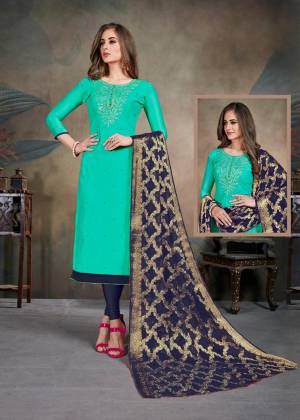 Celebrate This Festive Season With This Pretty suit In Sea Green Colored Top Paired With Navy Blue Colored Bottom and Dupatta. Its Top Is Fabricated On Modal Silk Paired With Cotton Bottom and Chiffon Jacquard Dupatta. Buy This Dress Material Now.