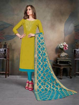 Celebrate This Festive Season With This Pretty suit In Pear Green Colored Top Paired With Blue Colored Bottom and Dupatta. Its Top Is Fabricated On Modal Silk Paired With Cotton Bottom and Chiffon Jacquard Dupatta. Buy This Dress Material Now.