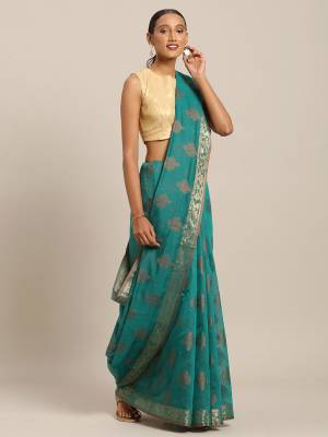 Grab This Traditional Weaved Designer Saree In Sea Blue Color Paired With Sea Blue Colored Blouse. This Saree And Blouse Are Fabricated On Cotton Handlloom Which Is Light In Weight, Durable And Easy To Carry. 