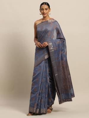 Grab This Traditional Weaved Designer Saree In Grey Color Paired With Grey Colored Blouse. This Saree And Blouse Are Fabricated On Cotton Handlloom Which Is Light In Weight, Durable And Easy To Carry. 