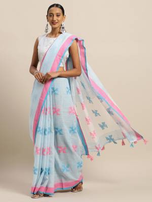 Rich And Elegant Looking Simple Saree Is Here For Your Semi-Casual Wear In Baby Blue Color Paired With Sky Blue Colored Blouse. This Saree and Blouse Are Fabricated On Linen Cotton. Its Color And Fabric Gives A Rich Look To Your Personality.  